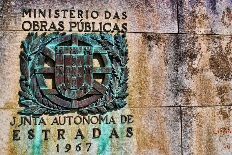 Coat of Arms of Portugal at a bridge in the City of Tomar