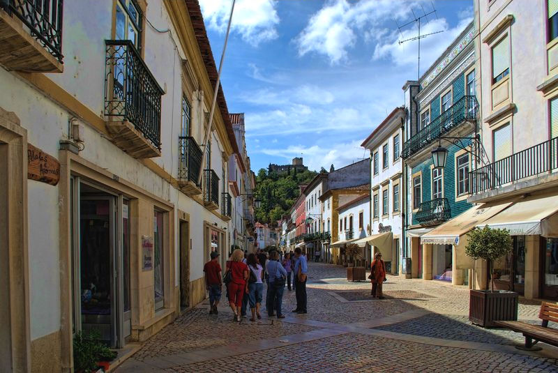 Talking at Rua Serpa Pinto in the City of Tomar in Portugal