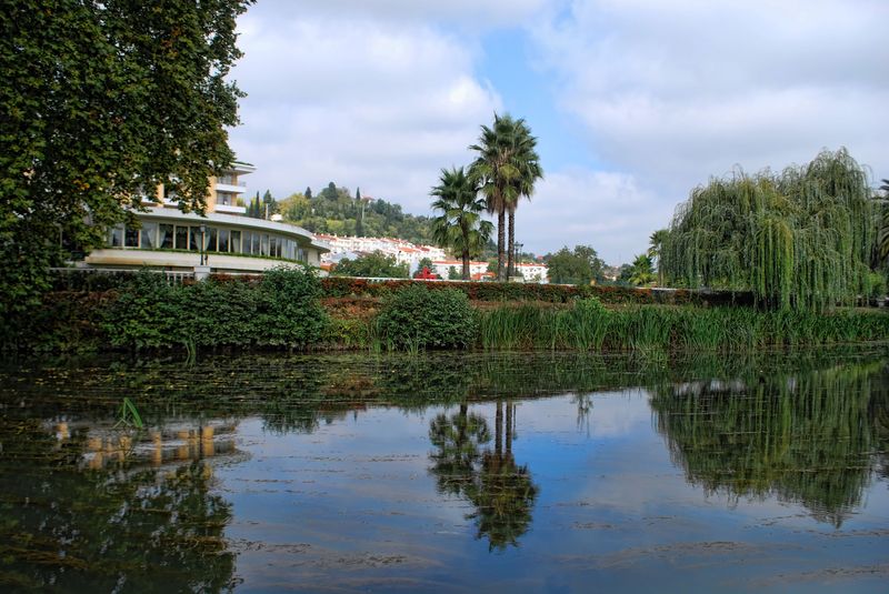 Hotel dos Templários and lush vegetaion at Nabão River in the City of Tomar
