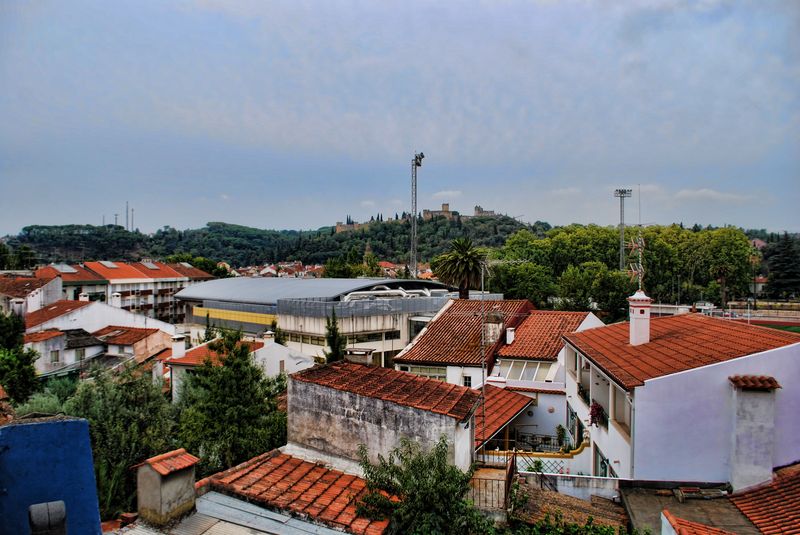 Rooftops in Tomar, Portugal in a cloudy day